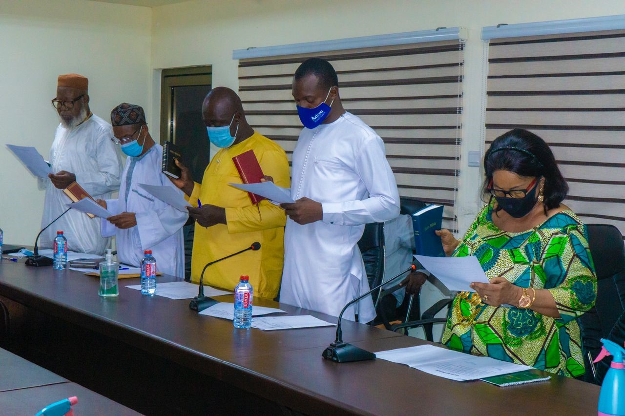 Mr Mubarak (second from the right) following the process during the induction ceremony